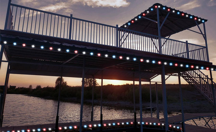 illuminated dock at dusk