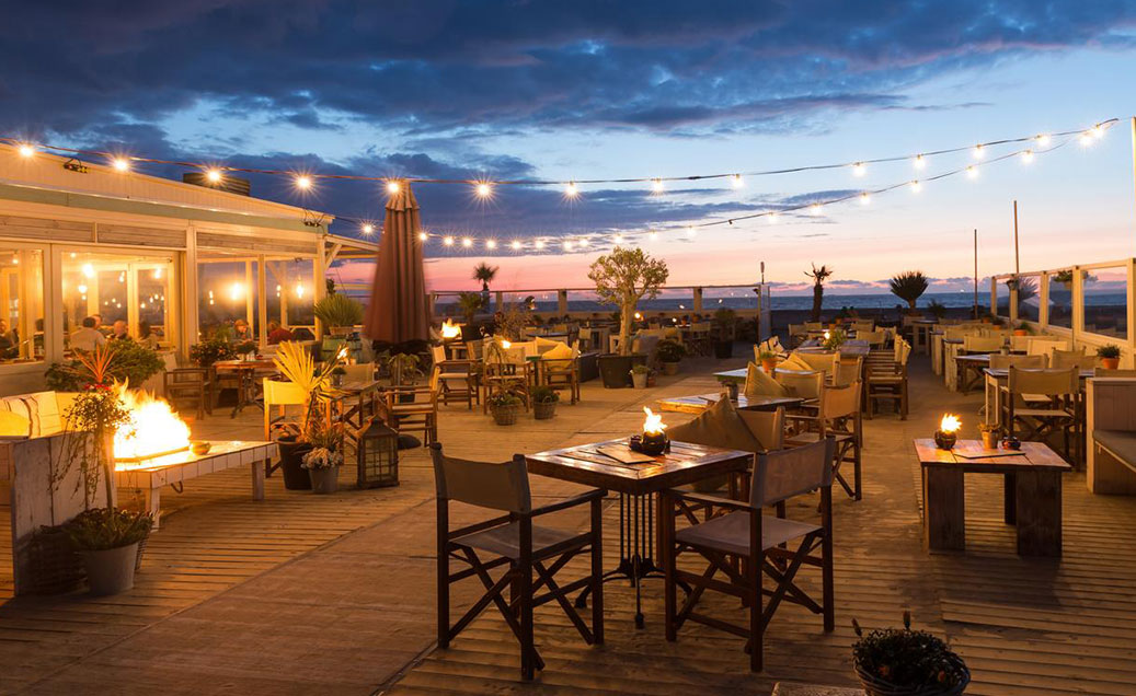 illuminated restaurant terrace at dusk